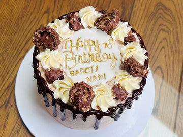 Eggless Ferrero Rocher Cake: Experience the Ultimate Chocolate Hazelnut Indulgence with : A Decadent Delight for Your Taste Buds!